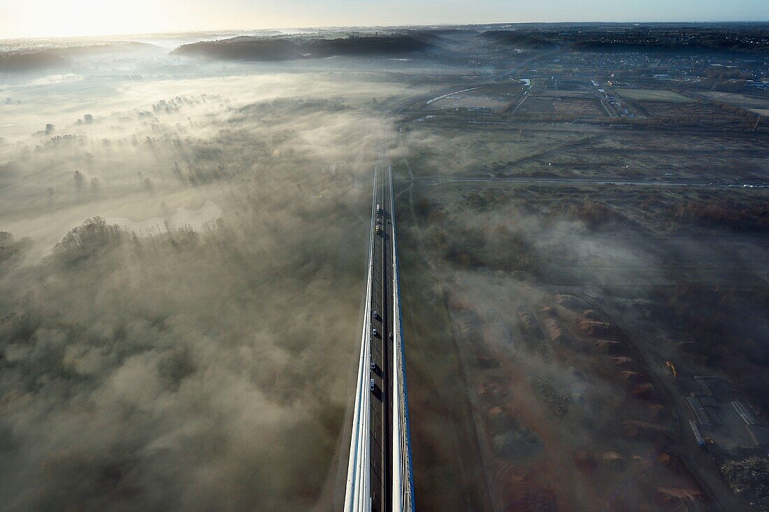 France,between Calvados and Seine Maritime,the Pont de Normandie (Normandy Bridge) at dawn,south access viaduct and Rivière-Saint-Sauveur viewed from the South Pylon