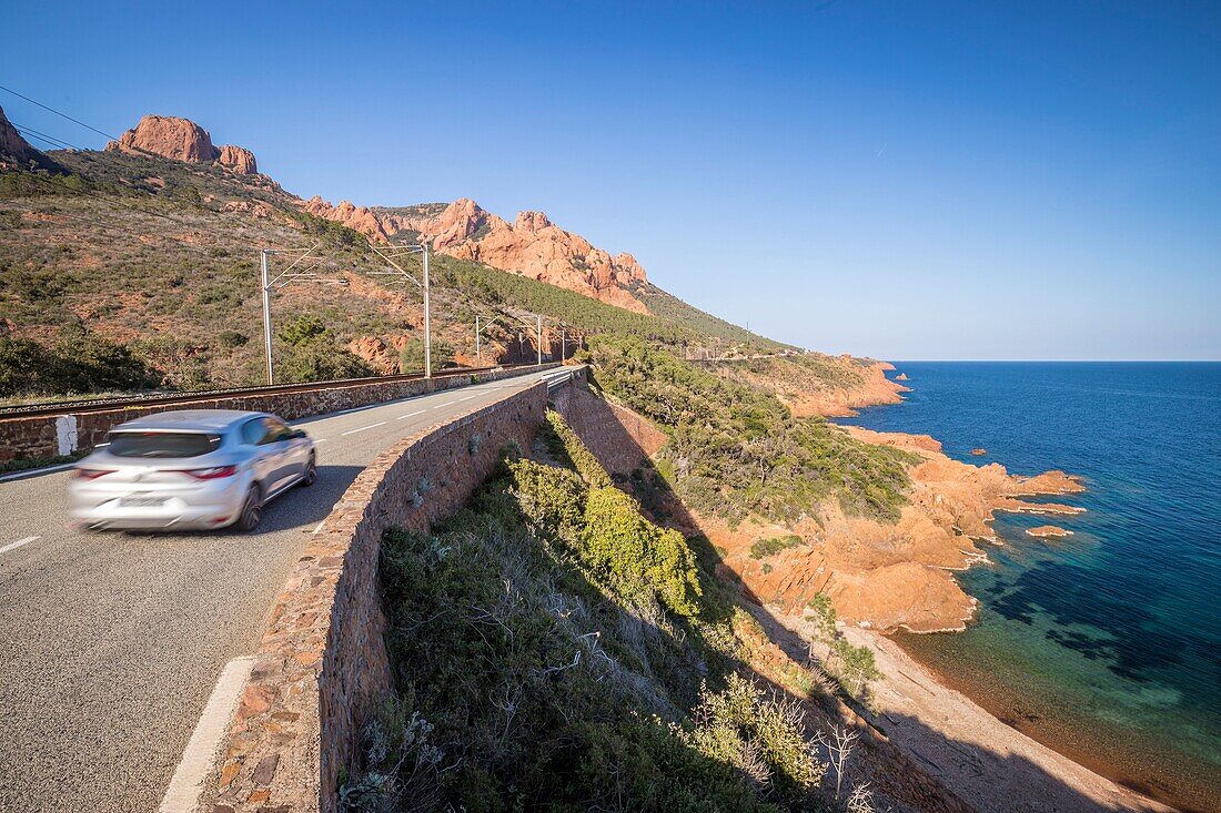 France,Var,Saint Raphael,littoral road of the Corniche d'Or,creek of Petit Caneiret to Antheor,in the background the Esterel massif and the peaks of the Cap Roux