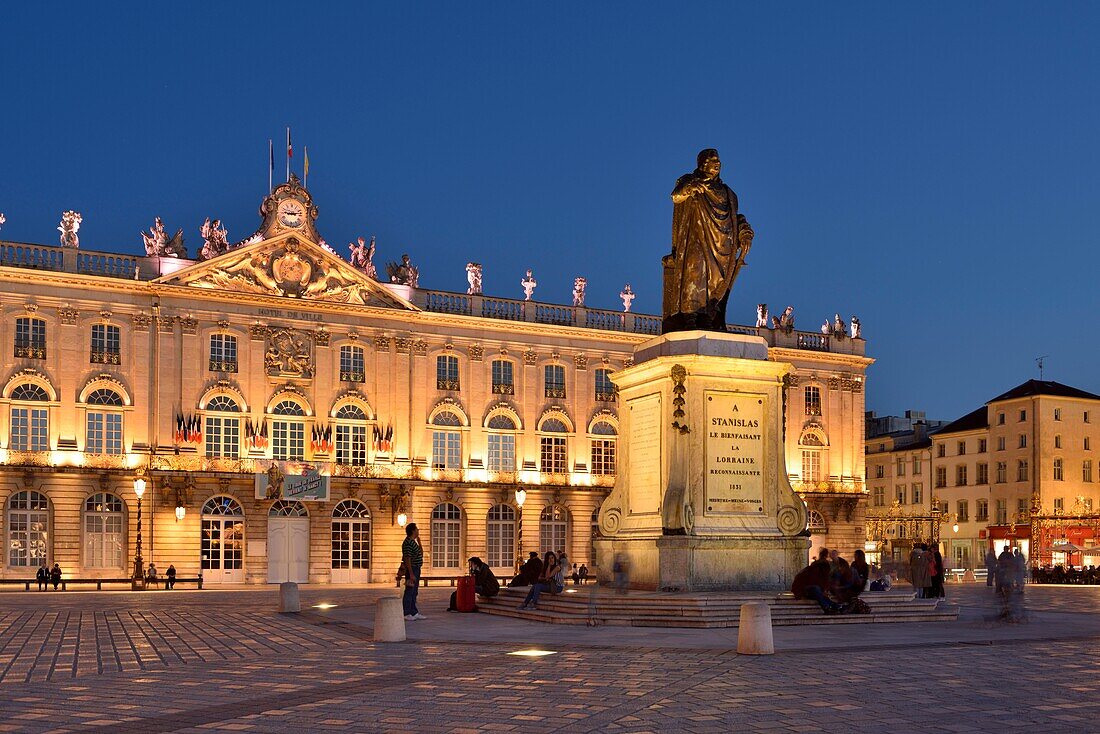 France,Meurthe and Moselle,Nancy,place Stanislas (former Place Royale) built by Stanislas Leszczynski,king of Poland and last duke of Lorraine in the eighteenth century,classified World Heritage of UNESCO,statue of Stanislas in front of the town hall by night