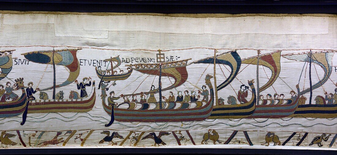 France,Calvados,Bayeux,Tapestry Museum,Bayeux Tapestry,Queen Mathilde Tapestry,listed as World Heritage by UNESCO,Duke Guillaume crosses the sea on a large ship and arrives in Pevensey ,the scenes of the Bayeux Tapestry are embroidered with woollen threads on a linen canvas