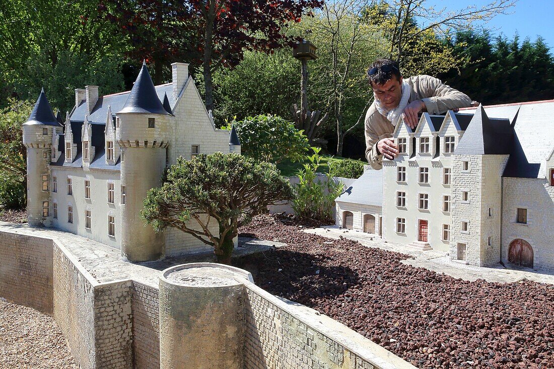 France,Indre et Loire,Loire valley listed as World Heritage by UNESCO,Amboise,Mini-Chateau Park,Guy Perier art maquetist in front a model