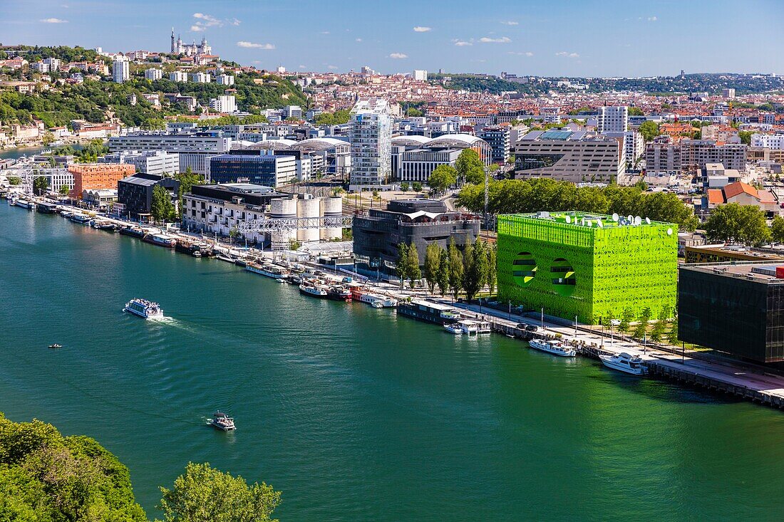 France,Rhone,Lyon,district of La Confluence in the south of the peninsula,first French quarter certified sustainable by the WWF,view of the quai Rambaud along the old docks with the Green Cube,the Sucriere,the Ycone tower and Notre Dame de Fourviere Basilica