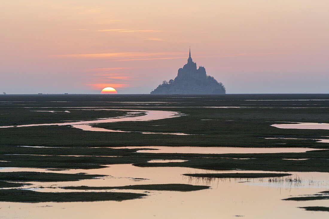 France,Manche,Mont Saint Michel bay,listed as World Heritage by UNESCO,the bay and Mont Saint Michel during fall high tides from the Roche Torin