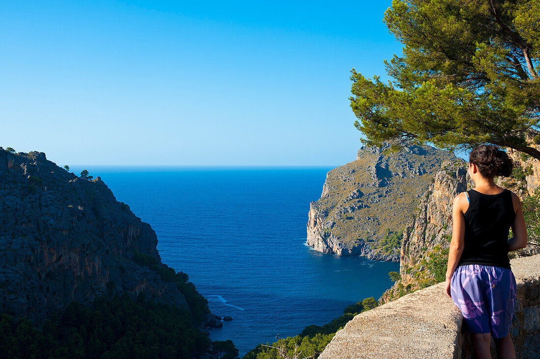 Girl Enjoying The View Of The Sea From Serra De Tramuntana,Mallorca,Balearic Islands,Spain