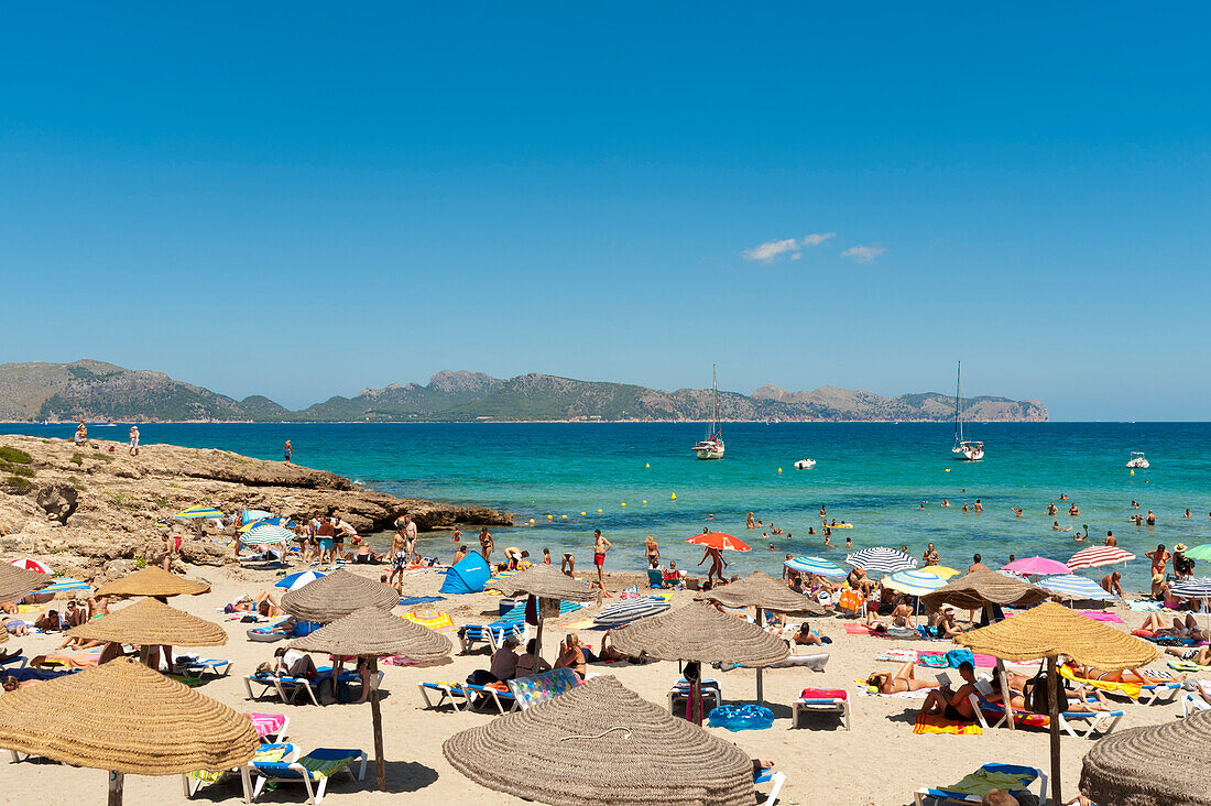 People Enjoying The Summer In Cala Sant Pere,Alcudia,Mallorca,Balearic Islands,Spain