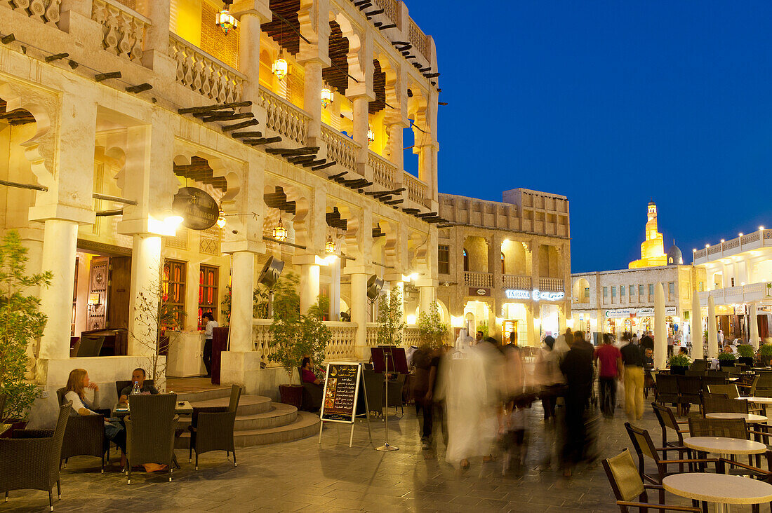 Qatar,People walking through Wafi souk at dusk,Doha