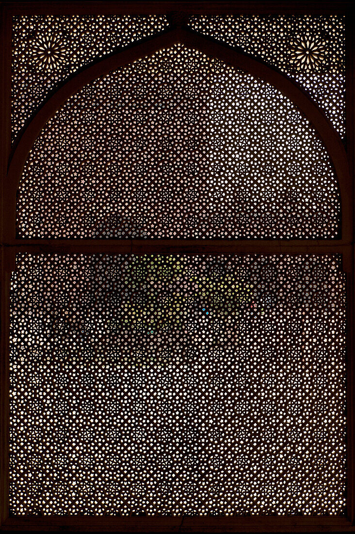 India,Fatehpur Sikri,Agra,Looking through stone lattice grill in Jami Masjid