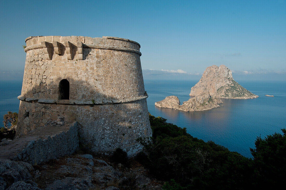 Spain,Torre des Savinar and Es Vedra island at dawn,Ibiza