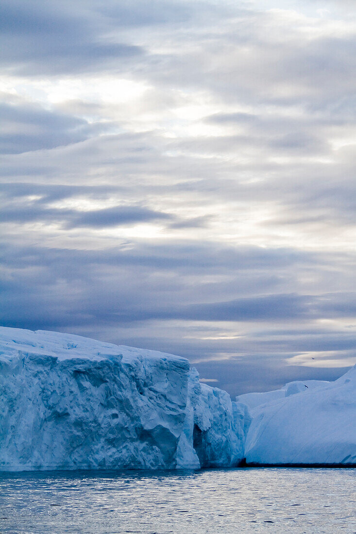 A Midnight Cruise Around The Ilulissat Ice Fjord,One Of Unesco World Heritage Sites. Greenland.