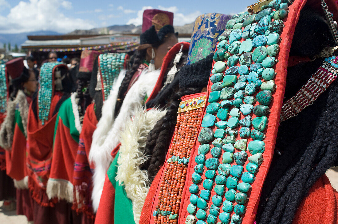 Traditional dancers in the opening parade of the Ladakh Festival. The Ladakh Festival is held every year in the first two weeks of September and celebrates local culture through dance and sport. Ladakh,Province of Jammu and Kashmir,India