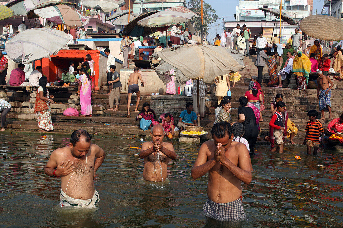 Praying and taking to the holy waters at Dashashwamedh Ghat the most famous and central bathing ghat. The culture of Varanasi is closely associated with the River Ganges and the river's religious importance.It is 'the religious capital of India'and an imp