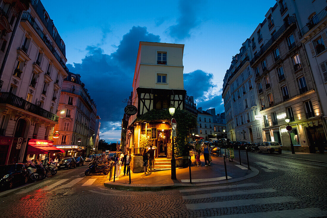 France,Montmartre,Paris,Corner restaurant at dusk