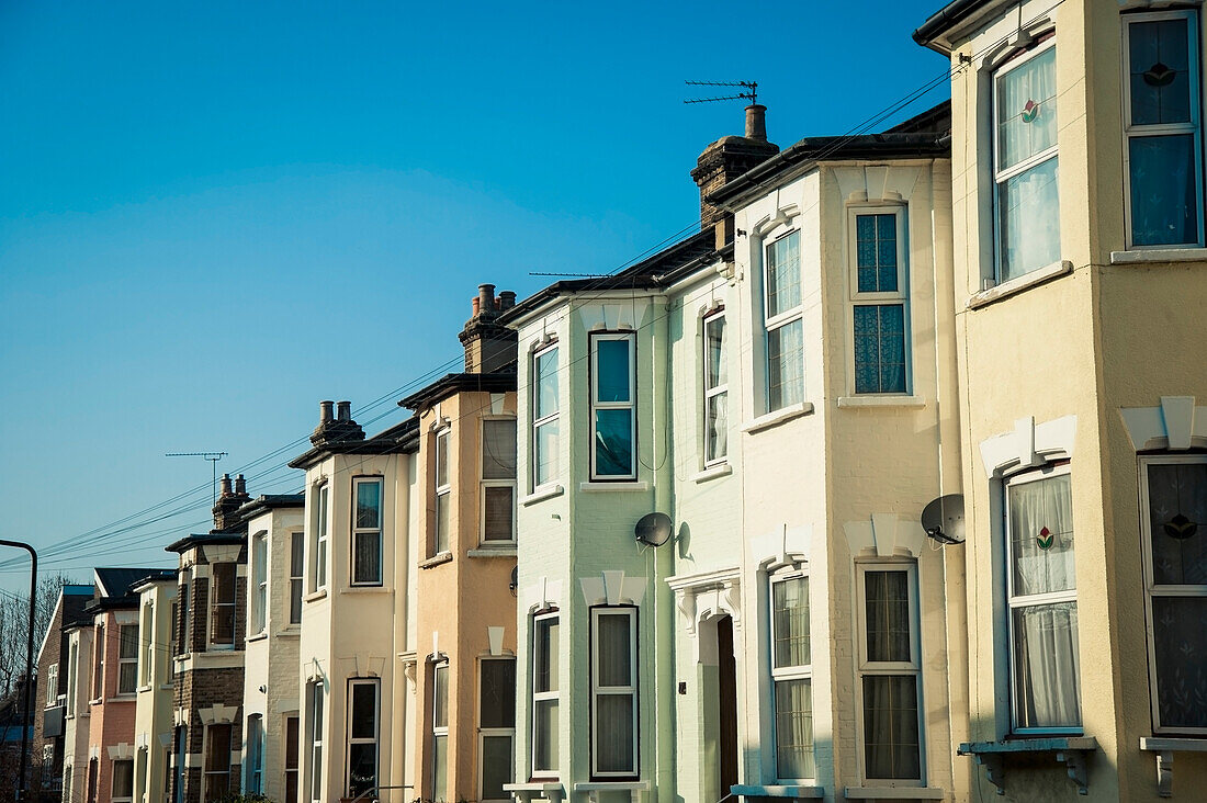 UK,England,Pastel coloured houses in Walthamstow Village,London