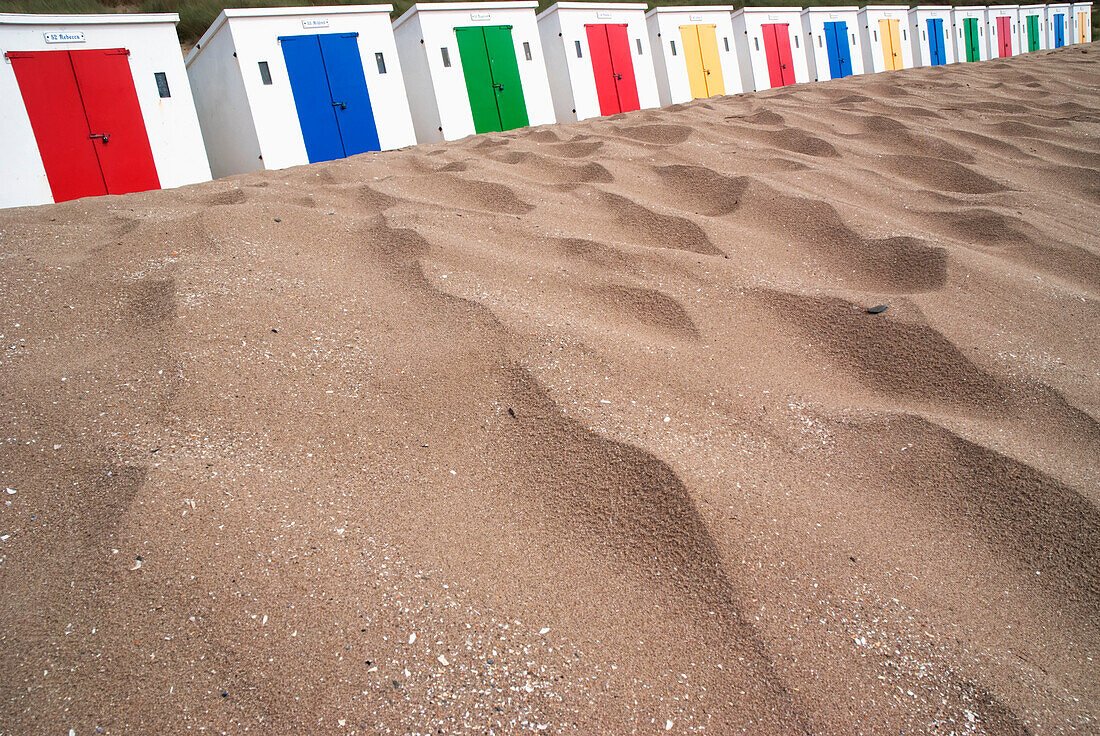UK,North Devon,Beach huts with colorful doors,Woolacombe