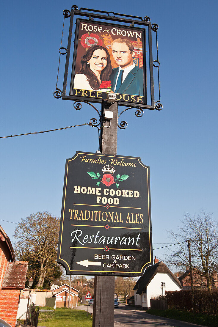 Prince William And Catherine,Duchess Of Cambridge Painted On Pub Sign At High Street,Tilshead,Wiltshire,England,Uk