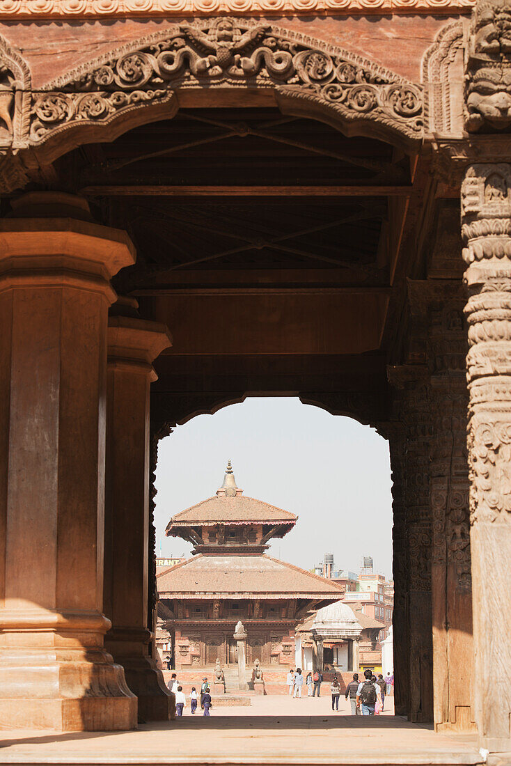 A View Through Collosal Carved Arches Towards The Gopi Nath Temple In Bhaktapur Durbar Square,Bhaktapur,Nepal