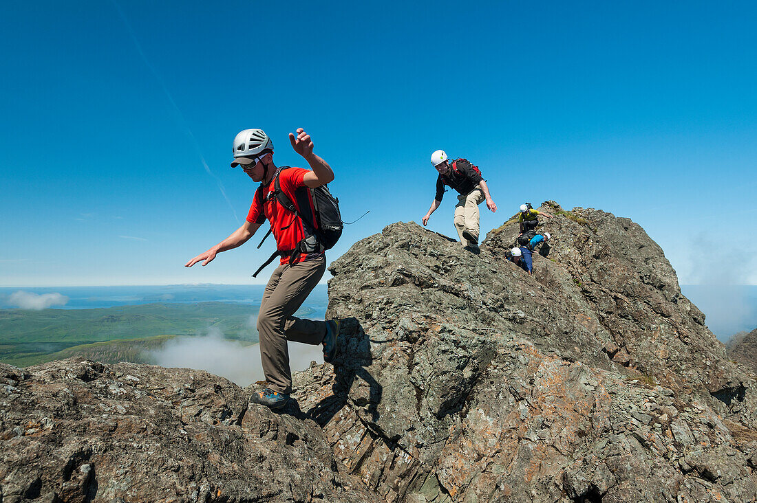 Climbers Going Up Ridge Near Sgurr A Mhadaidh In The Black Cuillin,Isle Of Skye,Scotland