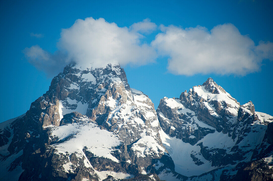 Clouds along a peak of the Grand Tetons in Grand Teton National Park,Wyoming,USA,Teton Village,Wyoming,United States of America