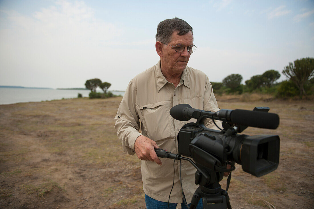 Videographer in Queen Elizabeth National Park in Uganda,Uganda