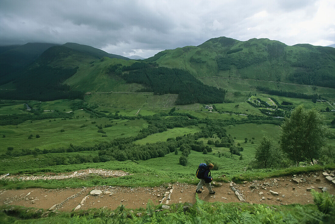 Hiker on the Ben Nevis trail in Scotland,Ben Nevis,Scotland