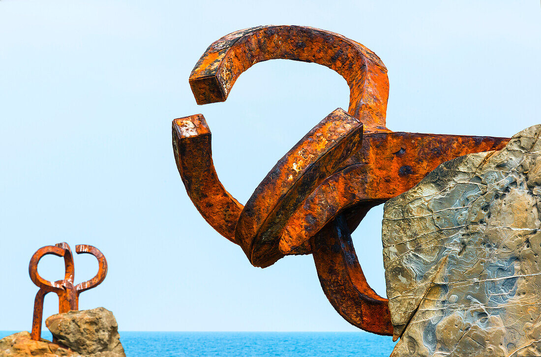 Bronze sculptures,Comb of the Wind by Eduardo Chillida,situated on the rocky shore of the Sea Resort Town of San Sebastian in Basque Country,San Sebastian,Province of Gipuzkoa,Spain