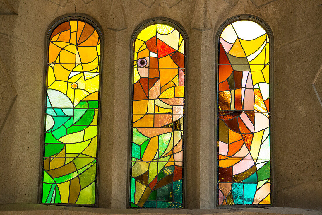 Stained glass arched windows in the Sagrada Familia Cathedral,Barcelona,Spain