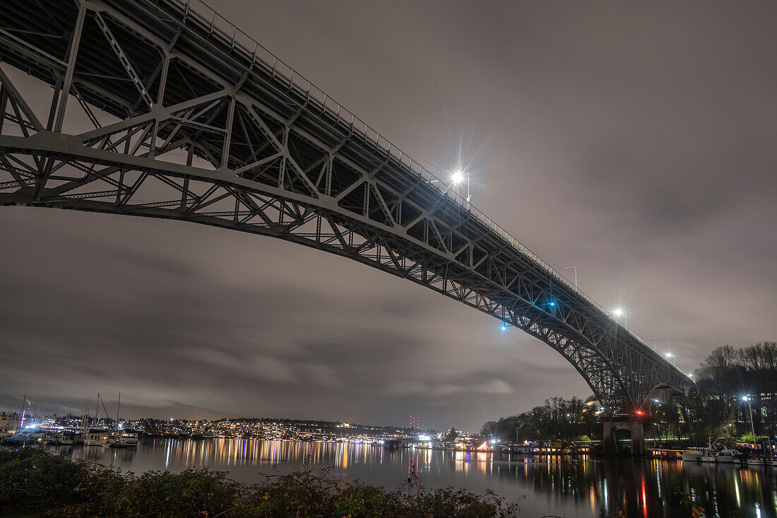 A rainy night view up Fremont Cut and across Lake Union to Eastlake,from under the Aurora Bridge in Seattle,Seattle,Washington,United States of America