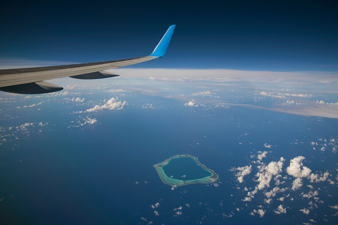 Atoll from a private jet near Tahiti,Tahiti