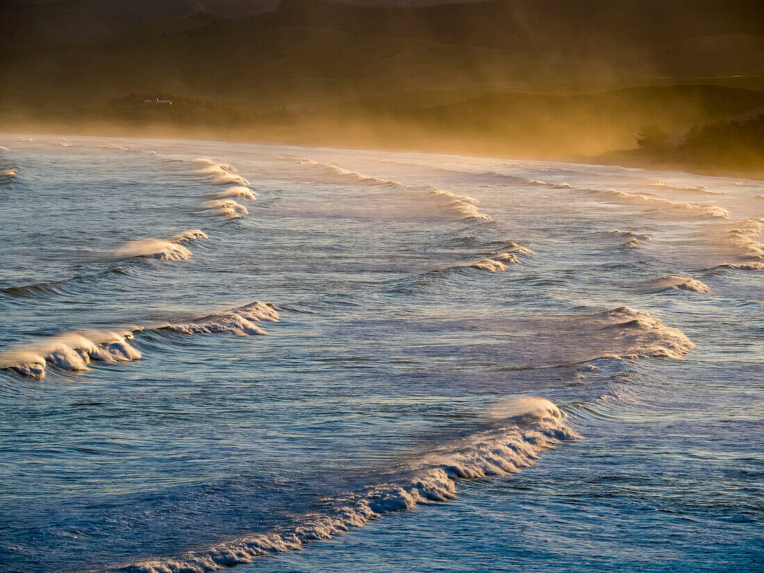 Waves of the Pacific Ocean come ashore near Katiki Point,Moeraki,Katiki Point,South Island,New Zealand