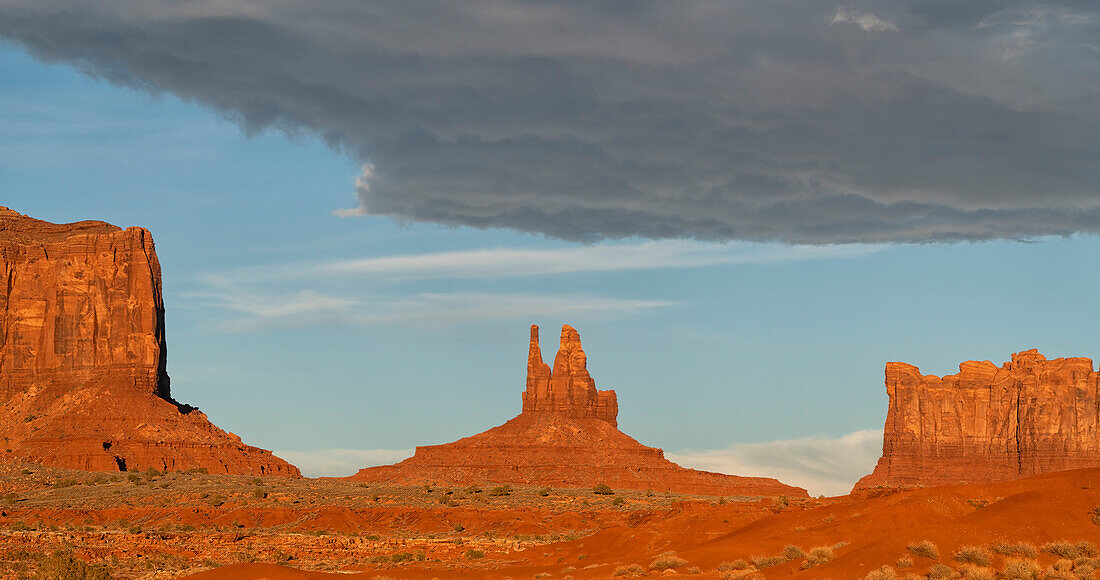 Rock formations of Monument Valley,Arizona.  The red rock glows at sunset as the light hits them,Arizona,United States of America