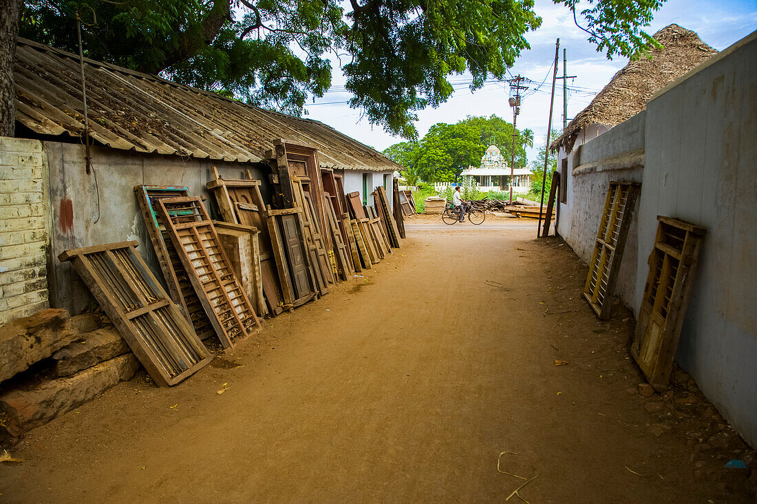 Street scene with a cyclist in India,Karaikudi,Chettinad,Tamil Nadu,India