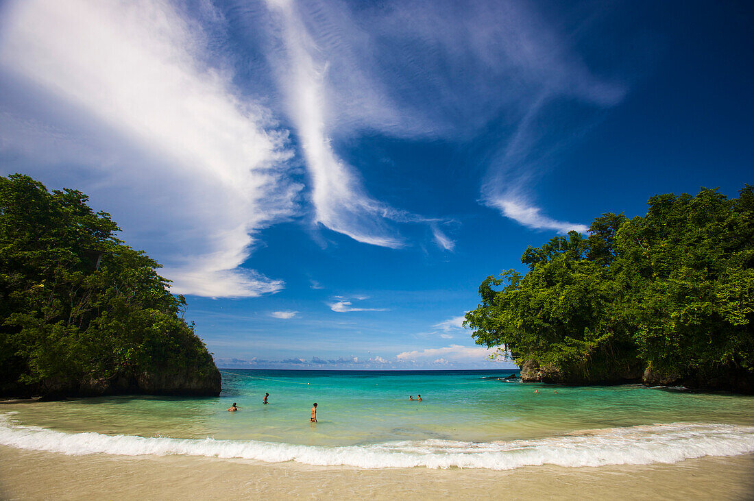 People enjoying a swim at Frenchman's Cove in Tobago,Port Antonio,Jamaica