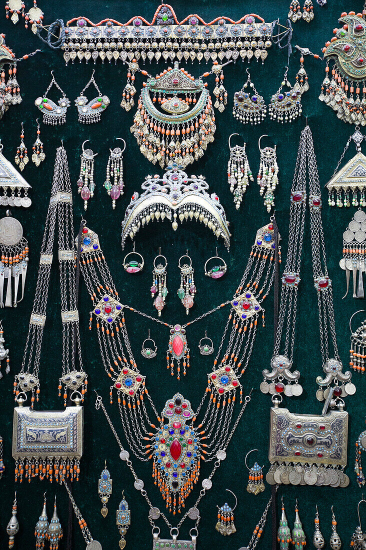 Jewelry Shop,close-up of collection of Islamic,Uzbek and Karakalpak jewelry displayed at the Tilla-Kari Mosque (completed in 1660) at Registan Square,Samarkland,Uzbekistan