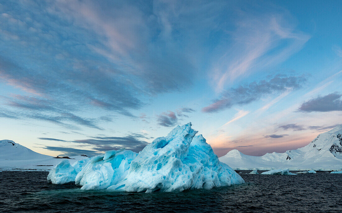 Iceberg and sunrise sky at 4:30 in the morning in the antarctic summer,Neumayer Channel,Antarctica