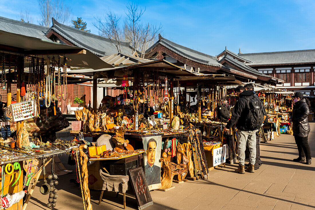 Souvenirs for sale at Yungang Grottoes,ancient Chinese Buddhist temple grottoes near Datong,China