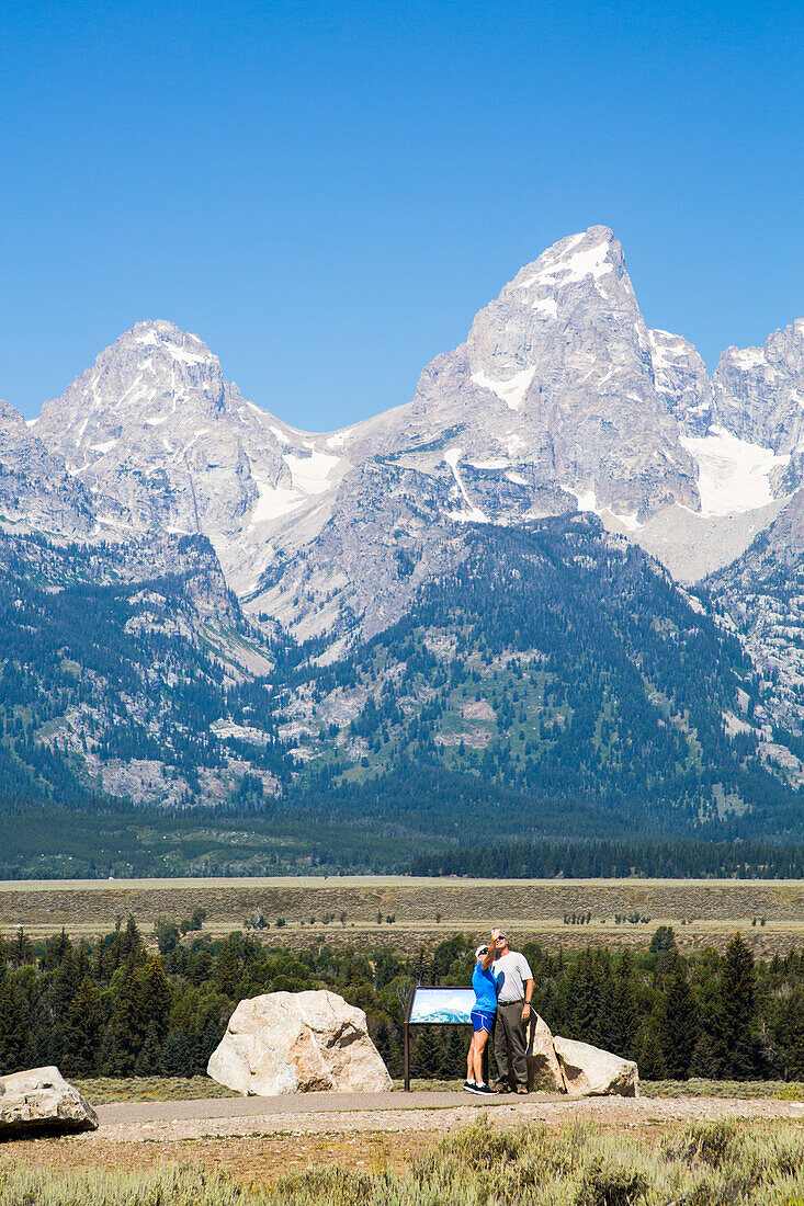 Tourists at viewpoint,Teton Range,Grand Teton National Park,Wyoming,United States of America