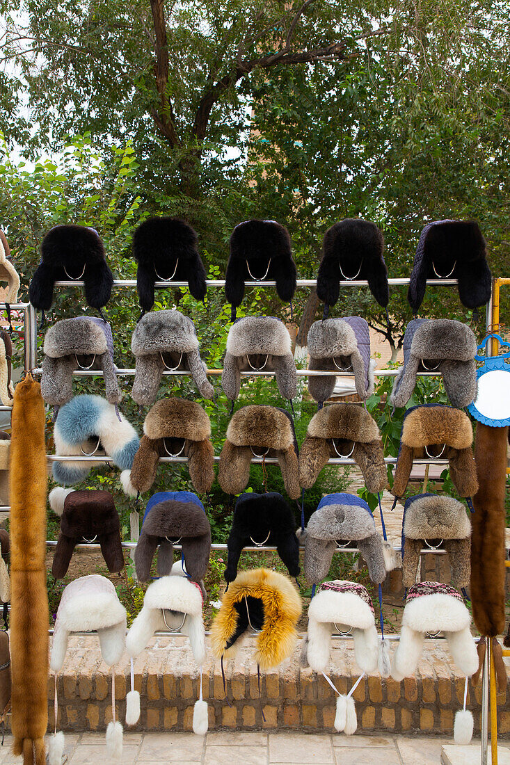 Faux fur hats for sale in Itchan Kala,Khiva,Uzbekistan