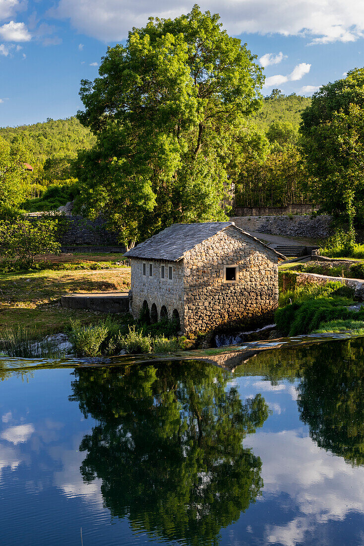 A small house located near a river,Bosnia