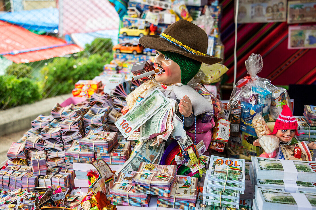Ekeko,the Tiwanaku civilization god of abundance and prosperity in the mythology and folklore of the people from the Bolivian Altiplano at the annual Alasitas fair,where people buy miniature gifts,La Paz,La Paz,Bolivia