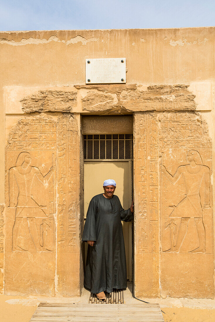 Local man standing in a doorway,Mastaba of Mereruka,Necropolis of Saqqara,UNESCO World Heritage Site,Saqqara,Egypt