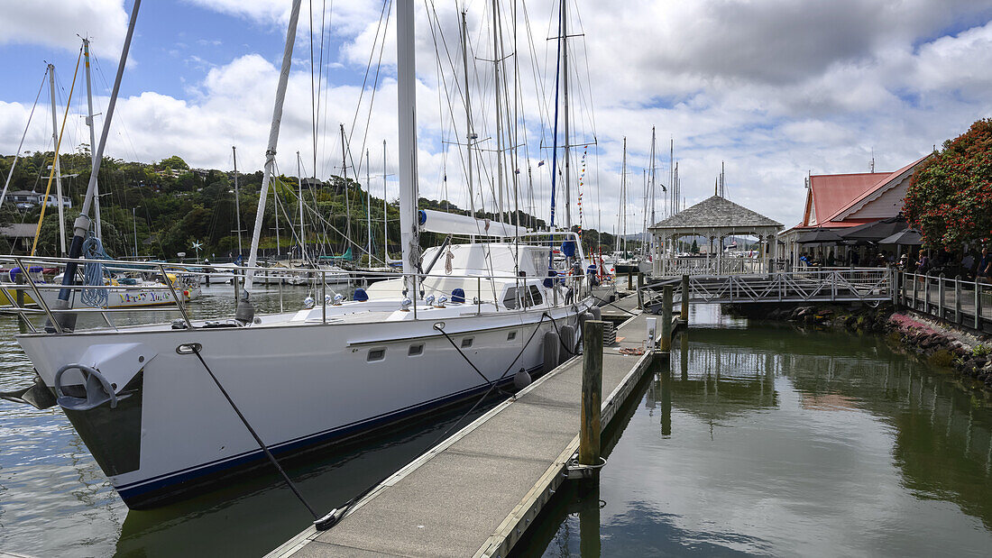 Sailboat moored at dock in marina in the city of Whangarei,known for it vibrant arts community,Northland,North Island,New Zealand