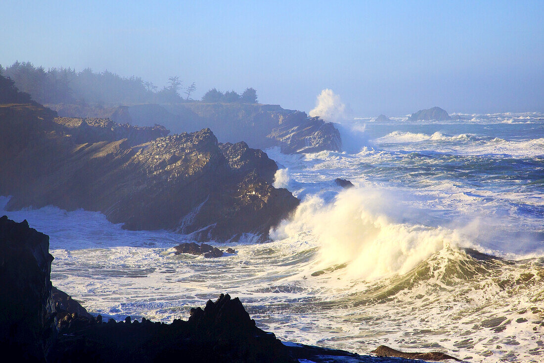 Waves crashing into the rugged Oregon coastline,Oregon,United States of America