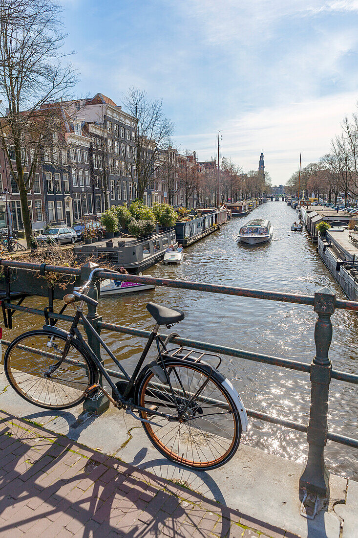 Bicycle parked on canal bridge,Lekkeresluis in Amsterdam,Amsterdam,North Holland,Netherlands