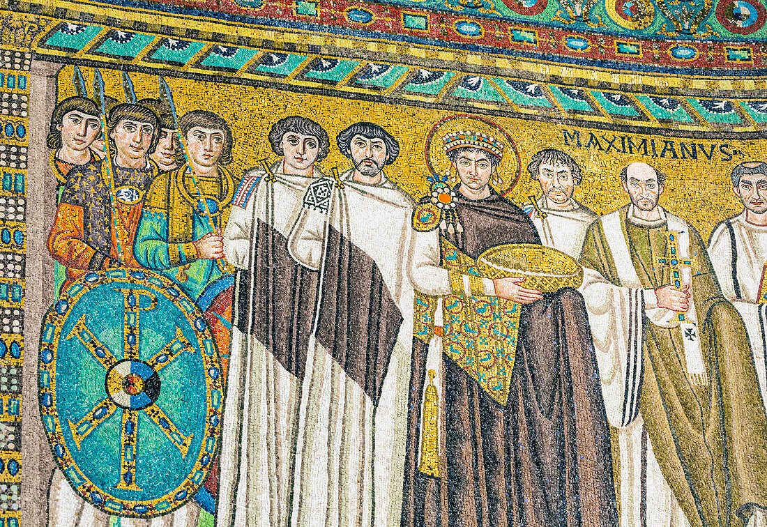 Ravenna,Ravenna Province,Italy. Mosaic in San Vitale basilica of Emperor Justinian I with members of his court. He is carrying a basket which possibly symbolizes the Eucharist.  The early Christian monuments of Ravenna are a UNESCO World Heritage Site.