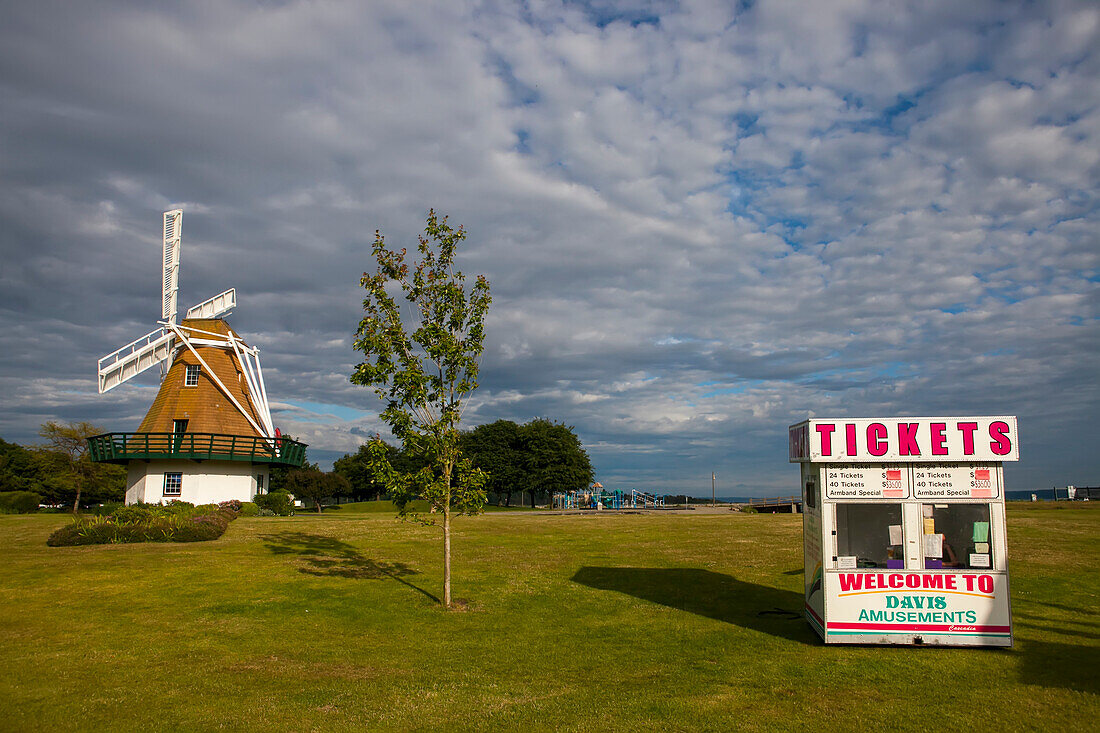 Ticket booth for a traveling carnival,with a windmill beside the Fairground in Windjammer Park on Whidbey Island,Oak Harbor,Washington,USA,Oak Harbor,Washington,United States of America