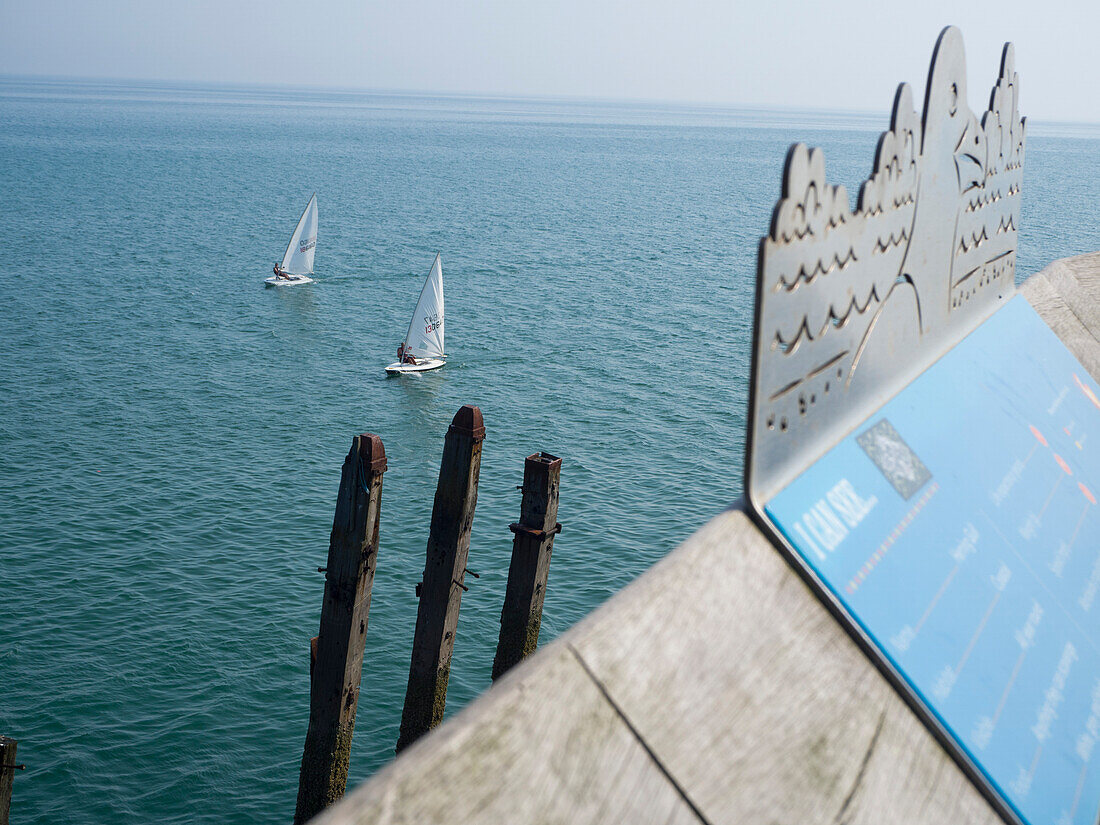 Sailboats on the English Channel viewed from the Hastings pier,Hastings,East Sussex,England