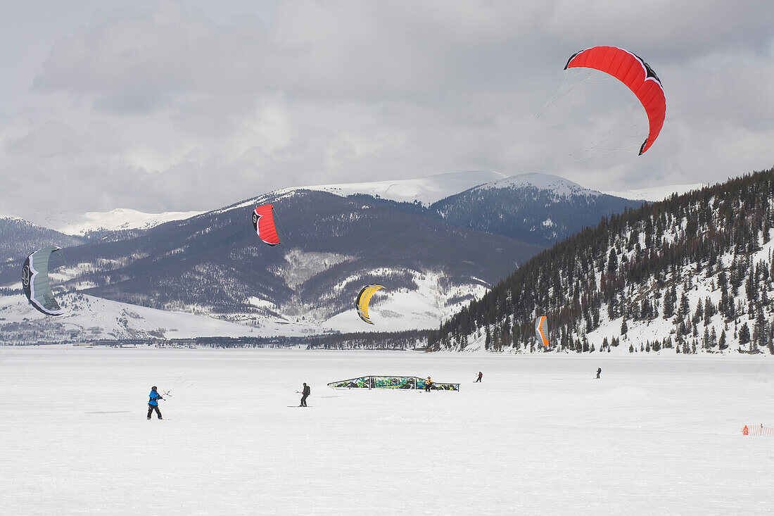 Kiteboarding on a frozen lake in winter.,Dillon Reservoir- Dillon,Colorado,USA