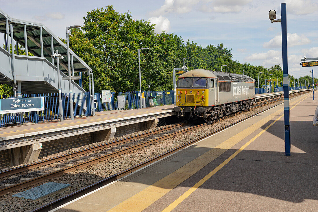 Passenger train on the tracks at a station in the UK,Oxford,England