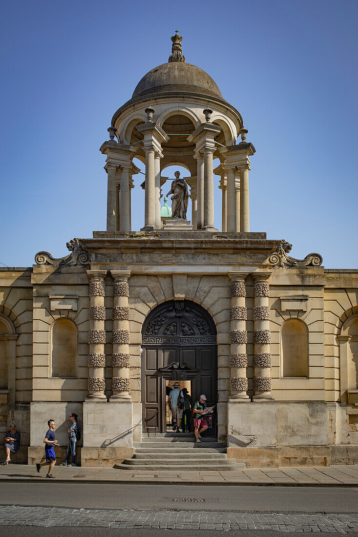 People at the entrance to The Queen's College on the University of Oxford campus in Oxford,UK,Oxford,England