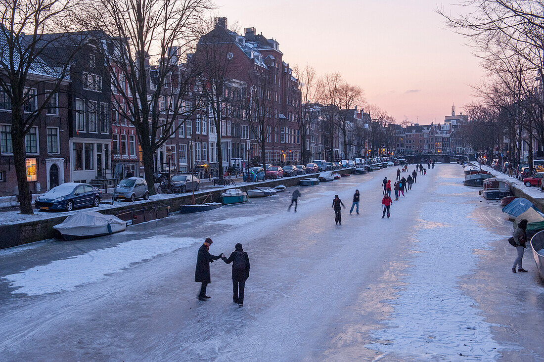 Ice skating on the canals,Amsterdam,Netherlands